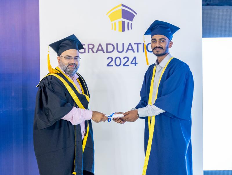 Abdullah Mangrio receiving his A Levels graduation certificate at Cedar College, PECHS, in 2024.